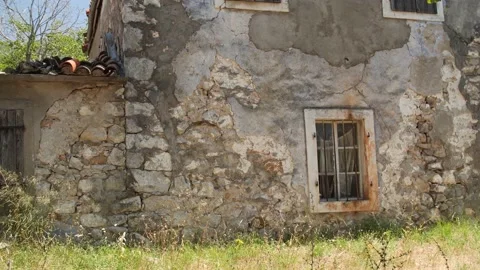 Concept of war and economic crisis. Abandoned old village house Stock Footage 218237133