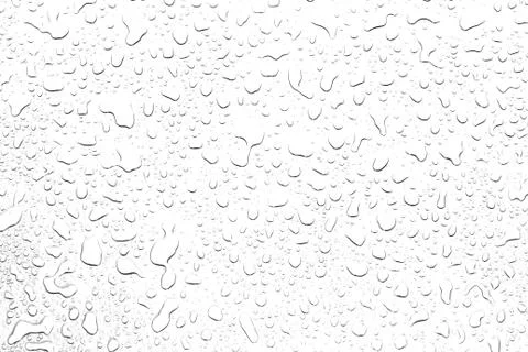 The concept of water drops on a black background. Stock Photos
