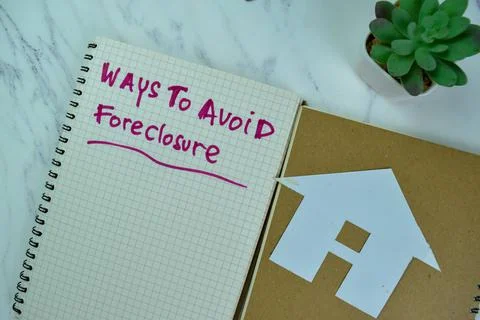 Concept of Ways to Avoid Foreclosure write on a book with statistics 写真素材