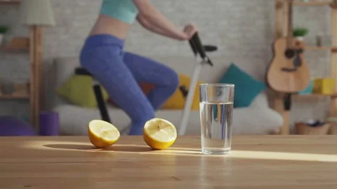 Concept of weight loss and proper nutrition,a glass of water and lemons on the Stock Footage 113863418