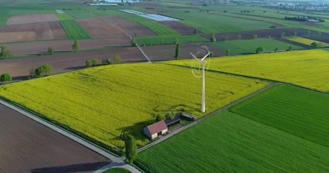 The concept of wind turbines in the field. Wind turbines concept. Wind turbines Video stock 248996356