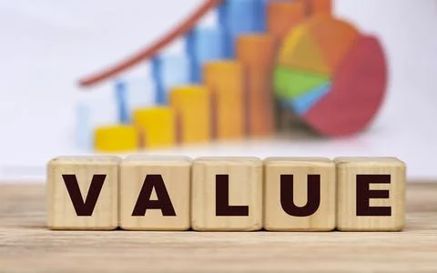 The concept of the word value on cubes against the background of the graph Stock Photos