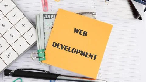 Concept word WEB DEVELOPMENT it is written on a sticker on the background o.. Foto stock