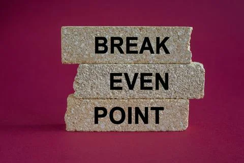 Concept words Break even point on brick block Stock Photos