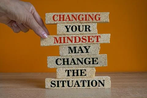 Concept words Changing your mindset may change the situation on brick blocks Stock Photos