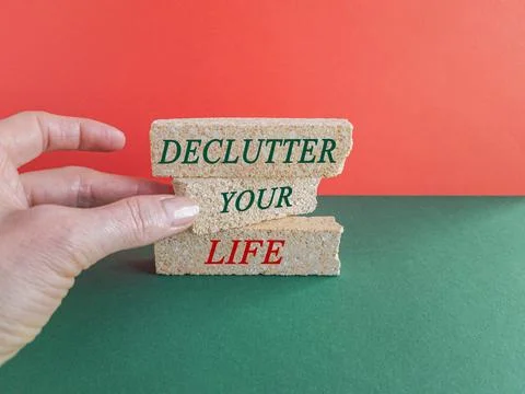 Concept words Declutter your life on brick blocks. Foto stock