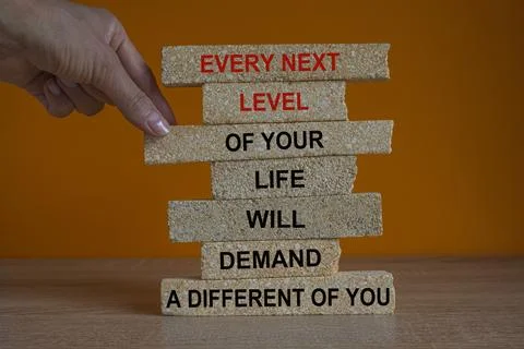 Concept words Every next level of your life will demand a different you. Stock Photos