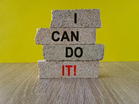 Concept words I can do it on brick blocks. Beautiful yellow background Stock Photos