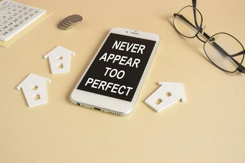 Concept words Never appear too perfect on the mobile phone screen. 스톡 사진