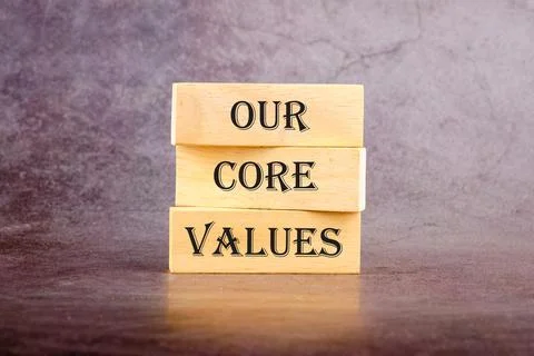 Concept words OUR CORE VALUES symbol on wooden blocks. The concept of a bus.. 写真素材
