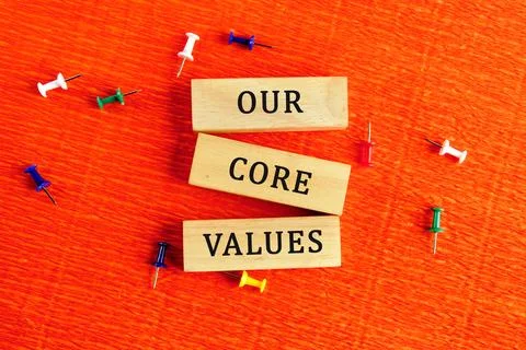Concept words OUR CORE VALUES symbol on wooden blocks. Bright background. The Foto stock