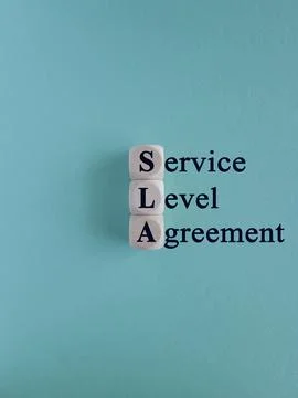 Concept words SLA service level agreement on wooden cubes. 스톡 사진