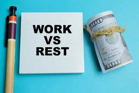 Concept of work vs rest write on sticky notes isolated on table. Stock Photos
