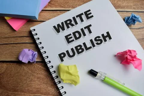 Concept of write edit publish write on book isolated on Wooden Table. Stock Photos