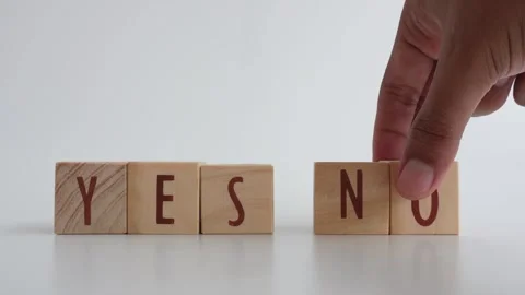 The concept of YES or NO decision-making written on wooden blocks. Stock Footage 335439605