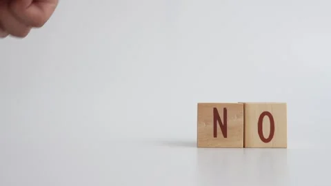 The concept of YES or NO decision-making written on wooden blocks. Stock Footage 335439611