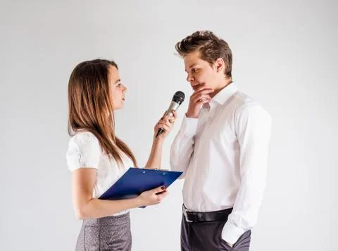 The concept. Young cute guy and girl are talking. The  Stock Photos
