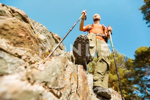 Concept, Young male with beard is traveling through the mountain, tourist Stock Photos