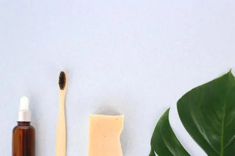 The concept of zero waste. bamboo toothbrush, solid shampoo and serum Stock Photos
