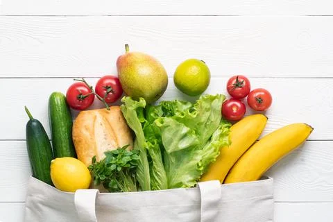 Concept of zero waste, environmental friendly products in a textile bag on a  Stock Photos