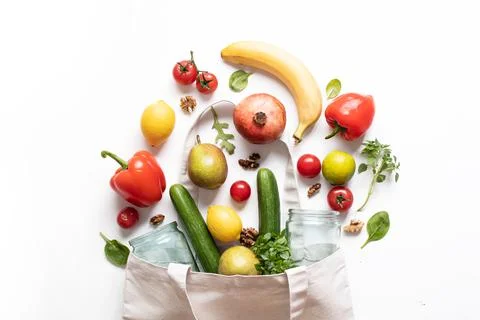 Concept of zero waste, environmental friendly products in a textile bag on a  Stock Photos