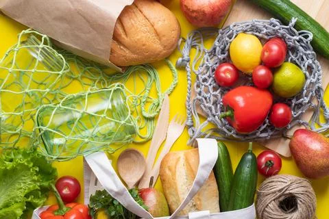 Concept of zero waste, environmental friendly products with textile bags, gla Stock Photos