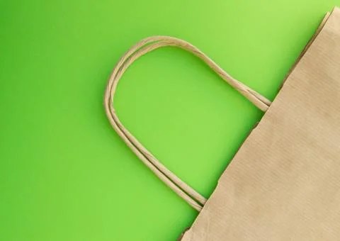 Concept of zero waste, reusable paper bag for shopping, free plastic, green b Stock Photos