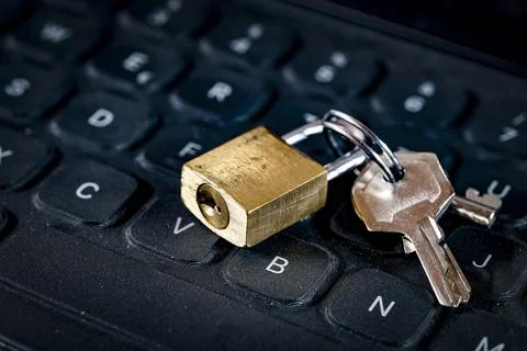 Conceptphoto .PC locking. Security lock on computer keyboard Stock Photos