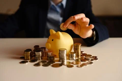 A conceptual background for saving and accumulating money for purchases, re.. Stock Photos