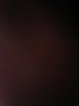 Conceptual burgundy background with different elements and illumination Foto stock