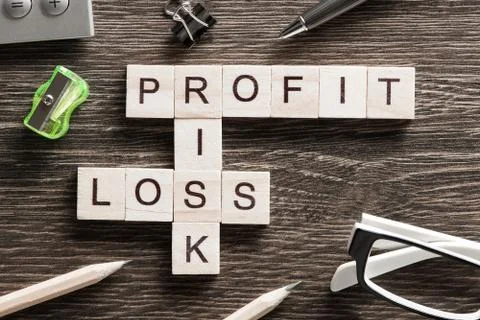 Conceptual business keywords on table with elements of game making crossword Stock Photos