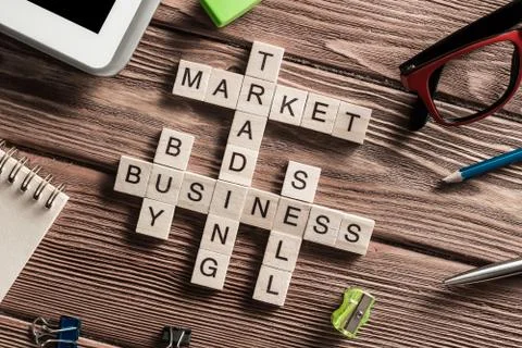 Conceptual business keywords on table with elements of game making crossword 스톡 사진
