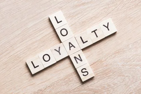 Conceptual business keywords on table with elements of game making crossword Stock Photos