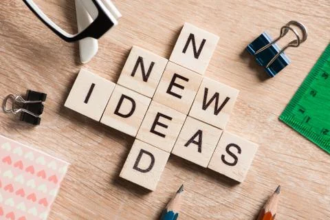 Conceptual business keywords on table with elements of game making crossword Stockfoto's