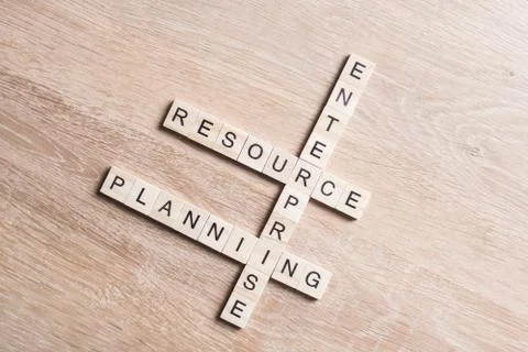 Conceptual business keywords on table with elements of game making crossword Stockfoto's