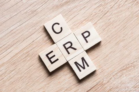 Conceptual business keywords on table with elements of game making crossword Foto stock