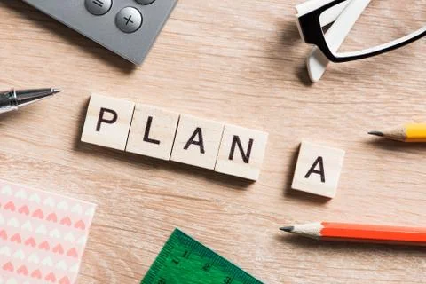 Conceptual business keywords on table with elements of game making crossword 스톡 사진