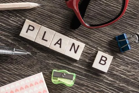 Conceptual business keywords on table with elements of game making crossword 스톡 사진