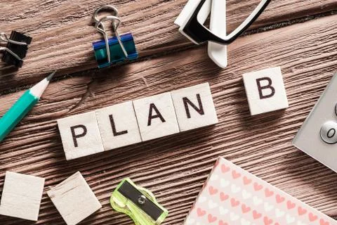 Conceptual business keywords on table with elements of game making crossword Stockfoto's