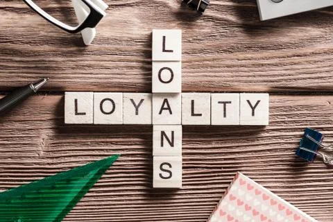 Conceptual business keywords on table with elements of game making crossword Stock Photos
