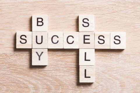 Conceptual business keywords on table with elements of game making crossword 스톡 사진