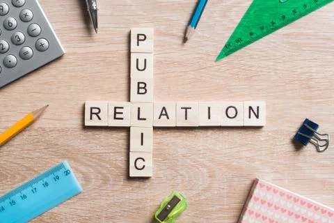 Conceptual business keywords on table with elements of game making crossword Stock Photos