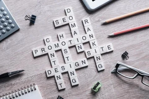 Conceptual business keywords on table with elements of game maki Stock Photos