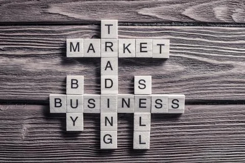 Conceptual business keywords on table with elements of game maki Stock Photos