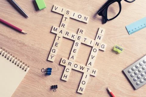 Conceptual business keywords on table with elements of game making Stock Photos