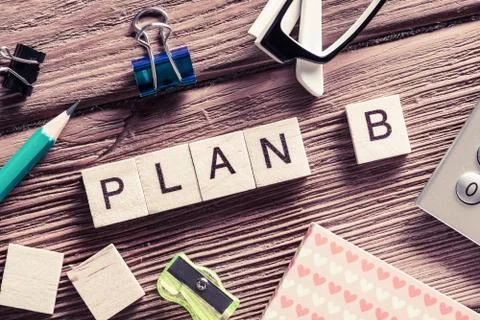 Conceptual business keywords on table with elements of game making crossword Stock Photos