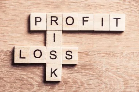 Conceptual business keywords on table with elements of game making crossword Stockfoto's