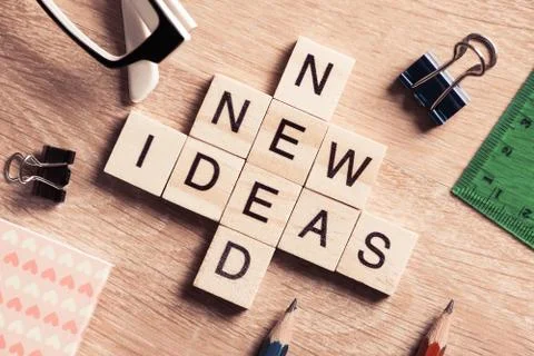 Conceptual business keywords on table with elements of game making crossword 스톡 사진