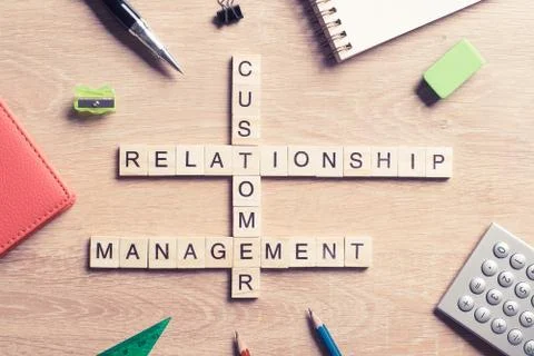 Conceptual business keywords on table with elements of game making crossword 스톡 사진