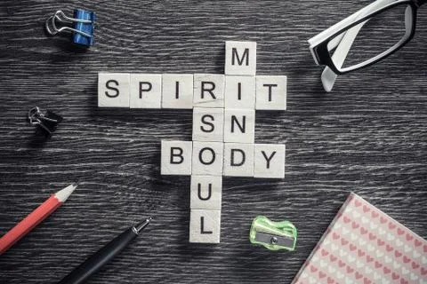 Conceptual business keywords on table with elements of game making crossword Stockfoto's